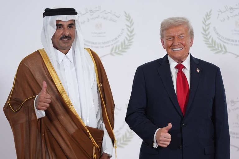President Donald Trump greets Qatar Prime Minister and Foreign Minister Sheikh Mohammed bin Abdulrahman bin Jassim Al Thani during a summit to support ending the more than two-year Israel-Hamas war in Gaza after a breakthrough ceasefire deal, Oct. 13, 2025, in Sharm El Sheikh, Egypt. (AP Photo/Evan Vucci, Pool)