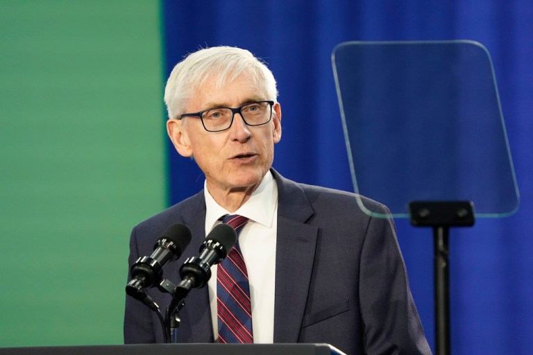 Wisconsin Gov. Tony Evers speaks prior to President Joe Biden's appearance at an event about canceling student debt, Monday, April 8, 2024, at the Madison Area Technical College Truax campus in Madison, Wis.