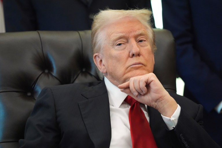President Donald Trump listens as Mehmet Oz, administrator of the Centers for Medicare & Medicaid Services, speaks during an event about drug prices.