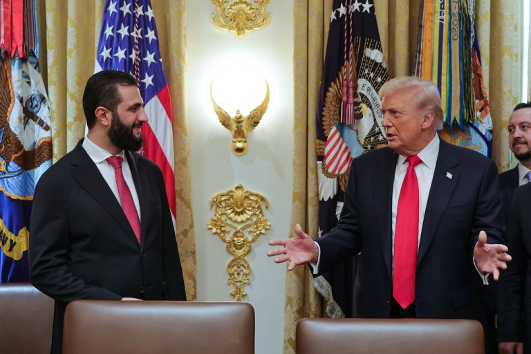 President Donald Trump speaks with Syrian President Ahmad al Sharaa at the White House.