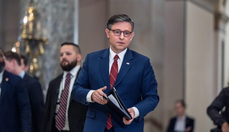 House Speaker Mike Johnson (R-LA) walks from the chamber to speak with reporters.