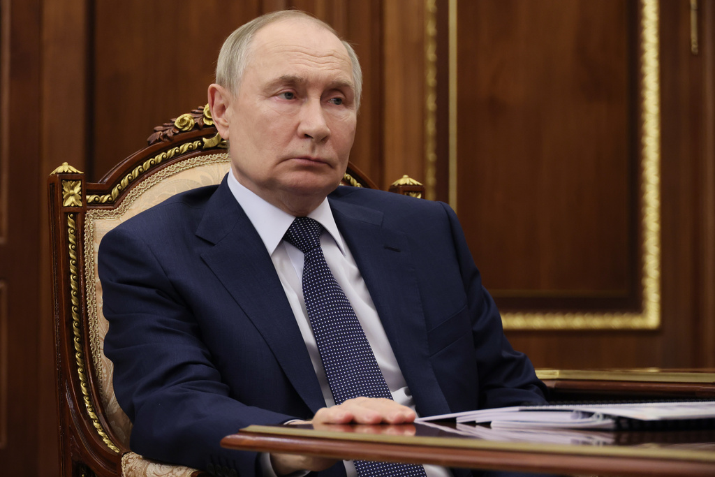 Russian missile strike on Odesa kills 8 as US hosts a Kremlin envoy for talks on peace plan