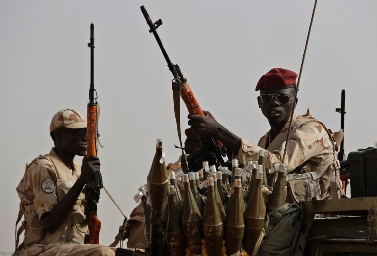 Sudanese soldiers from the Rapid Support Forces unit secure the area where Dagalo attends a military-backed tribe's rally.