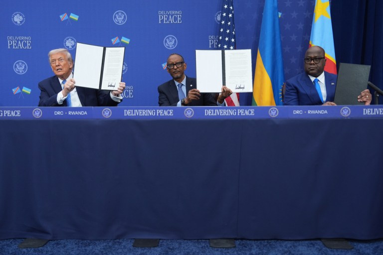 President Donald Trump, Rwanda's President Paul Kagame and Democratic Republic of Congo President Felix-Antoine Tshisekedi, during a signing ceremony at the U.S. Institute of Peace, Thursday, Dec. 4, 2025, in Washington.