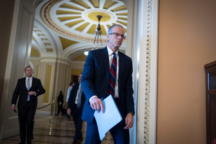 Senate Majority Leader John Thune, R-S.D., heads to a closed-door meeting with fellow Republicans, at the Capitol in Washington, Tuesday, Dec. 9, 2025