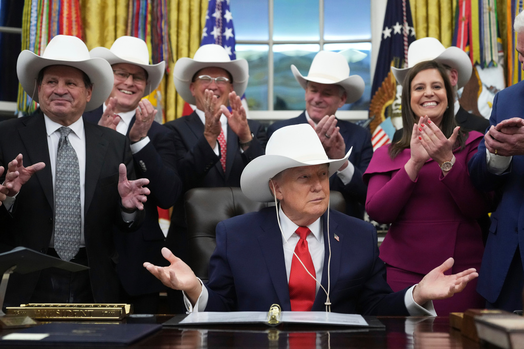 Trump dons cowboy hat and pays tribute to ‘Miracle on Ice’ hockey team as he makes digs at Somalis in Minnesota