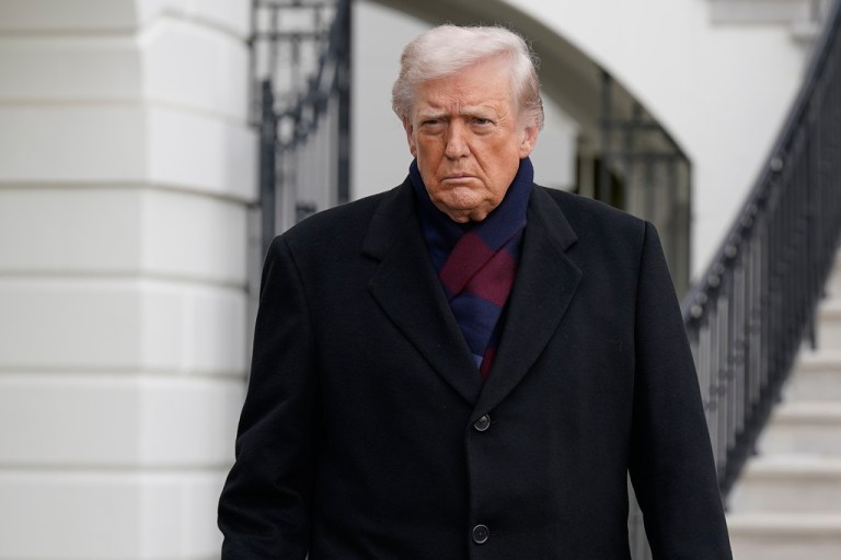 President Donald Trump talks to reporters as he departs from the South Lawn of the White House.