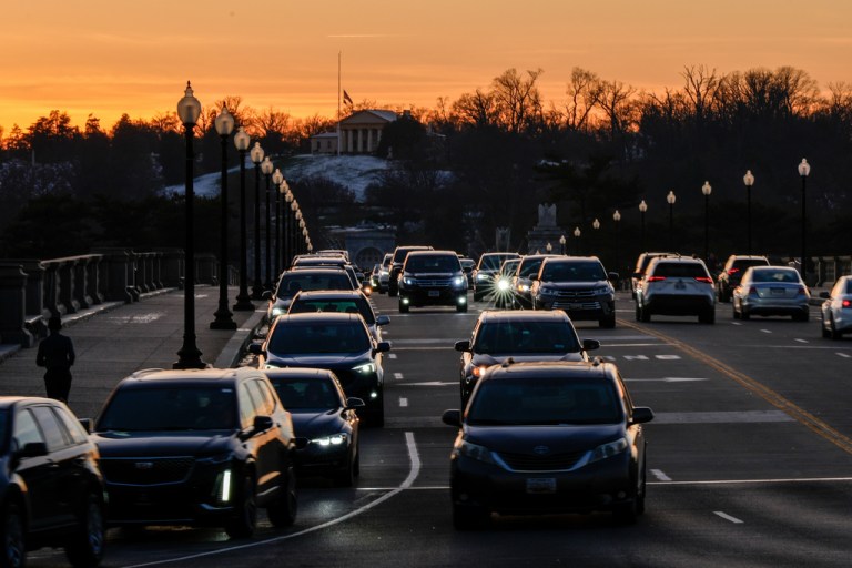 Cars driving during sunset