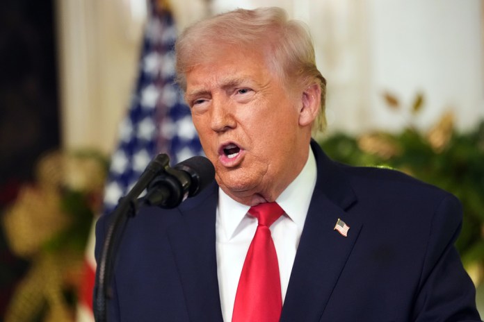 President Donald Trump speaks during an address to the nation from the Diplomatic Reception Room at the White House.