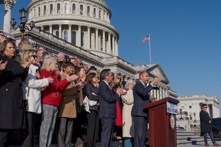House Minority Leader Hakeem Jeffries, D-N.Y., joined by the Democratic Caucus, speaks to reporters as they call for a vote on an extension of Affordable Care Act subsidies, at the Capitol in Washington, Thursday, Dec. 18, 2025. (AP Photo/J. Scott Applewhite)