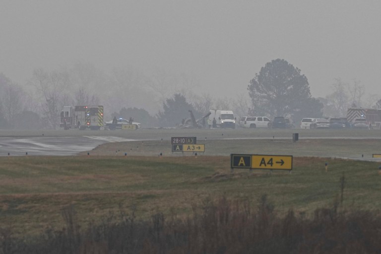 First responders tend to the scene of a reported plane crash at a regional airport in Statesville, N.C., Thursday, Dec. 18, 2025.
