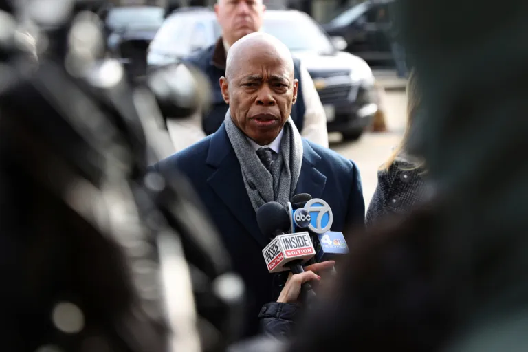 NYC Mayor Eric Adams speaks to the press after the arrival of Luigi Mangione, a suspect in the fatal shooting of UnitedHealthcare CEO Brian Thompson, Dec. 19, 2024, in New York.