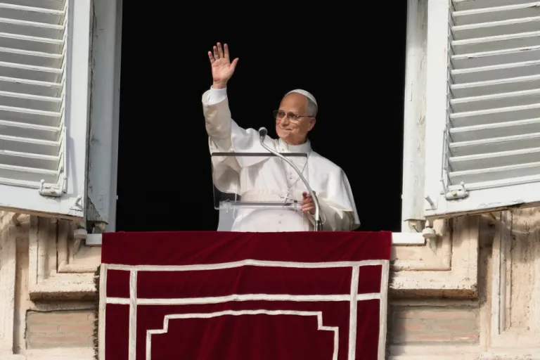 Pope Leo XIV delivers the Angelus noon prayer in St. Peter's Square.
