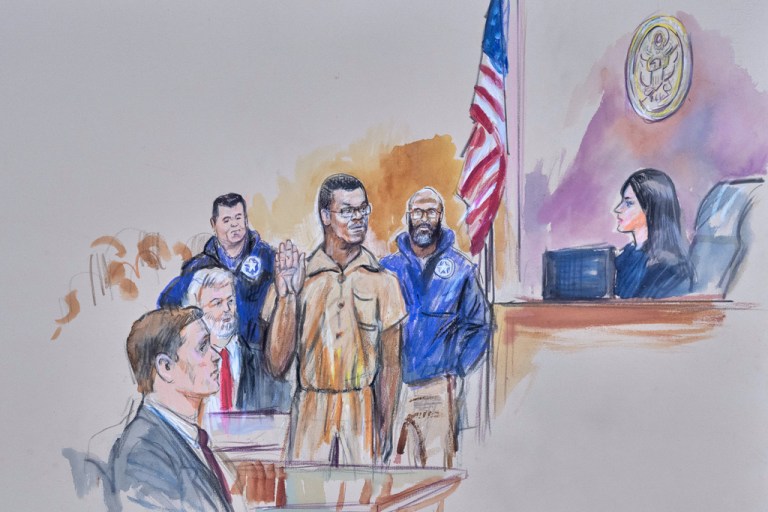 A courtroom sketch of Brian Cole Jr., 30, of Woodbridge, Virginia, the man accused of planting a pair of pipe bombs outside the headquarters of the Republican and Democratic national parties on Jan. 5, 2021, in Washington, being sworn in, Friday, Dec. 5, 2025, before U.S. Magistrate Moxila Upadhyaya, at Federal Court in Washington, as U.S. Attorney Charles Jones and Defense Attorney John Shoreman look on.