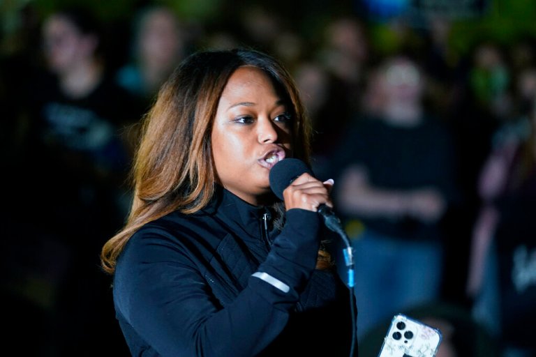 District of Columbia Ward 4 Councilwoman Janeese Lewis George, speaks to a crowd of people gathered outside the Supreme Court.