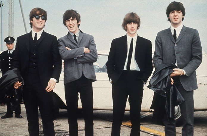 The Beatles, from left, John Lennon, George Harrison, Ringo Starr and Paul McCartney arrive in Liverpool, England, July 10, 1964. (AP Photo)
