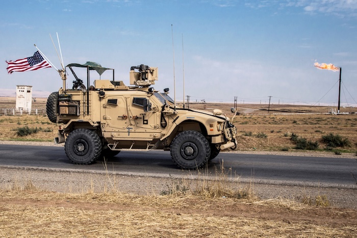 U.S. forces patrol oil fields in Syria.