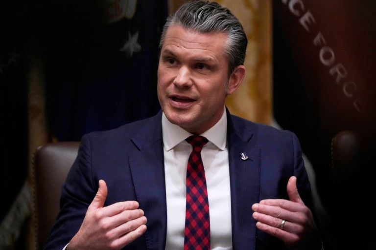 War Secretary Pete Hegseth speaks during a Cabinet meeting at the White House.