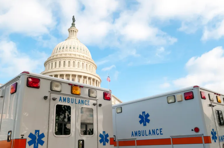 Ambulances parked in front of the U.S. Capitol Building in Washington DC. They are here 24 hours a day incase a Congressman or anyone else at the Capital needs assistance.