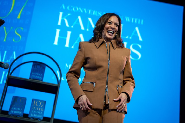 Former Vice President Kamala Harris exits the stage after the first stop of her book tour for her new book about her presidential campaign, 