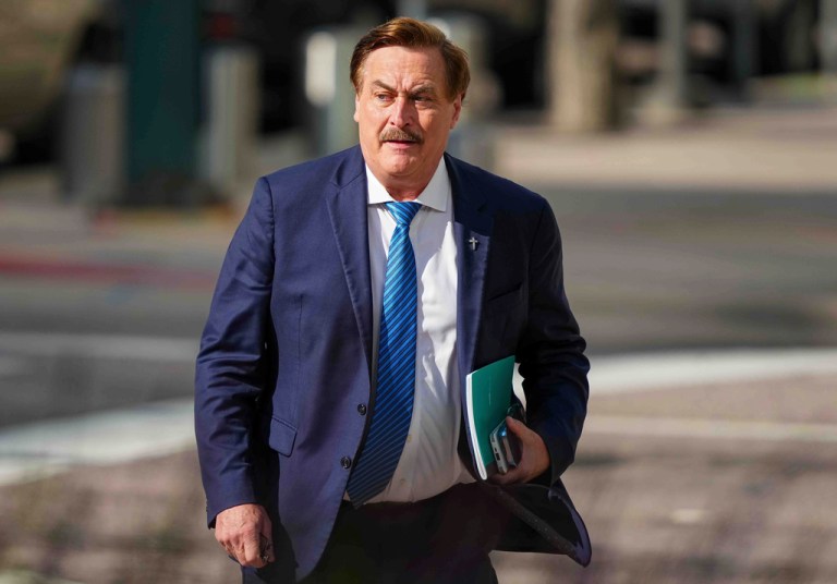 Mike Lindell walks into federal district court for a defamation trial, June 5, 2025, in Denver.