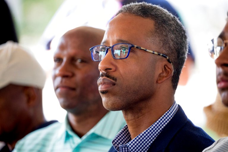 Ward Five Councilmember Kenyan McDuffie attends a news conference where Golden State Warriors guard Stephen Curry announced that he would be sponsoring the creation of men's and women's golf teams at Howard University, Monday, Aug. 19, 2019, at Langston Golf Course in Washington.