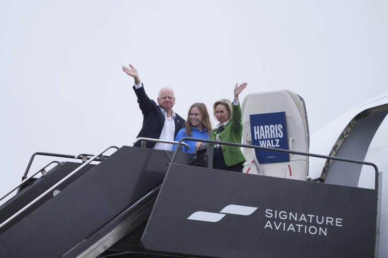 Democratic vice presidential nominee Minnesota Gov. Tim Walz with his daughter Hope Walz and wife Gwen Walz.