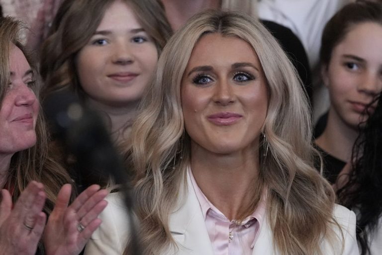 President Donald Trump acknowledges Riley Gaines as he speaks before signing an executive order barring transgender female athletes from competing in women's or girls' sporting events, in the East Room of the White House, Wednesday, Feb. 5, 2025, in Washington.