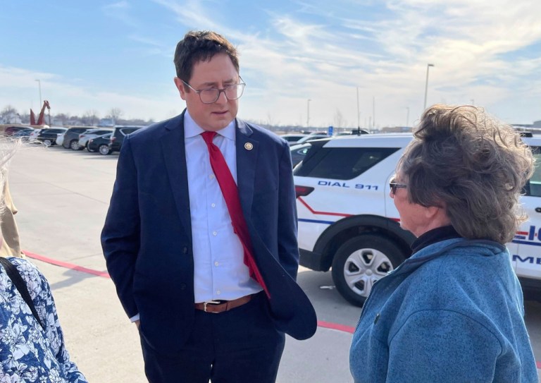 Republican U.S. Rep. Mike Flood speaks to constituents before holding a town hall Tuesday, March 18, 2025, in Columbus, Neb.