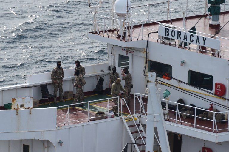 Soldiers stand on the deck on the tanker Boracay that allegedly belongs to Russia's so-called shadow fleet, Thursday, Oct. 2, 2025, off Saint-Nazaire, France's Atlantic coast.