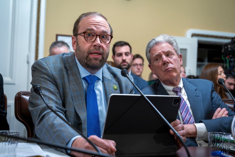 Rep. Jason Smith, R-Mo., chair of the House Ways and Means Committee, joined at right by Rep. Frank Pallone, D-N.J., ranking member of the House Energy and Commerce Committee, speaks as the House Rules Committee prepares Republican legislation to address health care affordability, at the Capitol in Washington, Tuesday, Dec. 16, 2025. (AP Photo/J. Scott Applewhite)