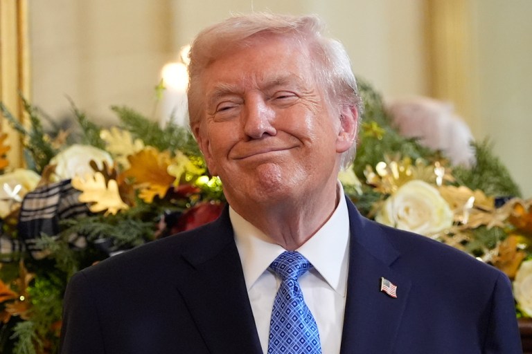 President Donald Trump smiles during a Hanukkah reception in the East Room of the White House, Tuesday, Dec. 16, 2025, in Washington.