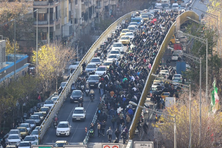 Protesters march in downtown Tehran, Iran.