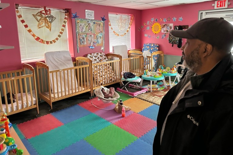 ABC Learning Center director Ahmed Hasan stands in the infant room at his day care center.