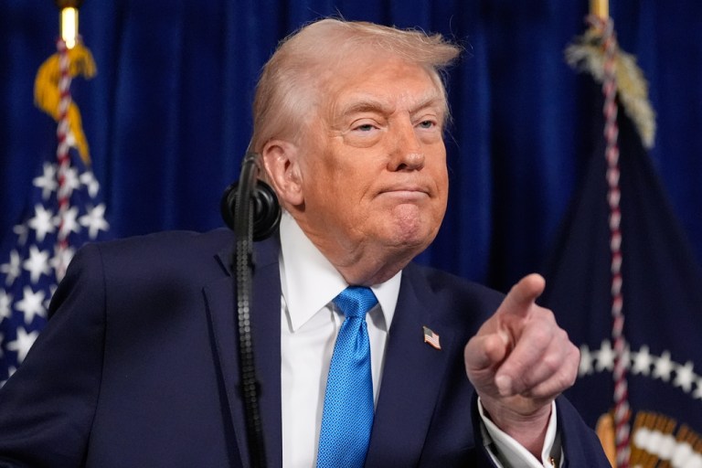 President Donald Trump points to a reporter to ask a question during a news conference at Mar-a-Lago, Saturday, Jan. 3, 2026, in Palm Beach, Fla.