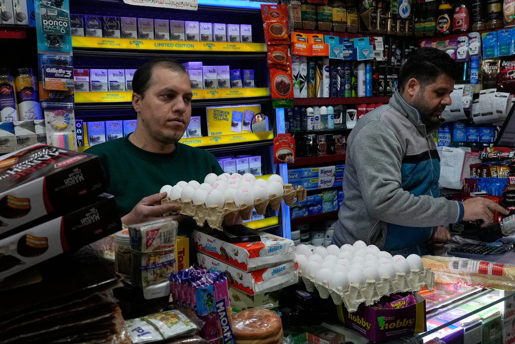 Iran rolls out $7 payments to quell affordability protests