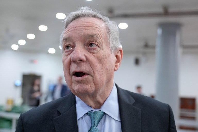 Sen. Dick Durbin, D-Ill., speaks with reporters at the Senate Subway on Capitol Hill, Thursday, Jan. 8, 2026, in Washington. (AP Photo/Mariam Zuhaib)