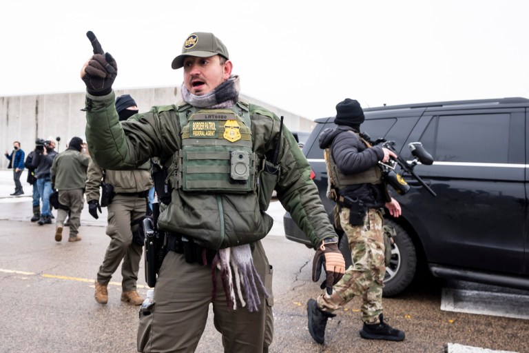 Federal agents and police clash with protesters outside the Bishop Henry Whipple Federal Building in Minneapolis