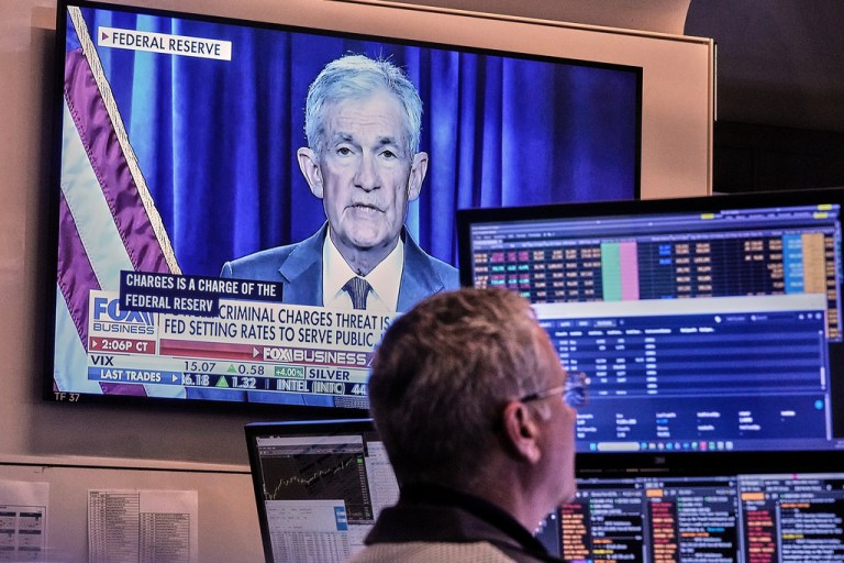 A video of Federal Reserve Chair Jerome Powell plays on a screen on the floor of the New York Stock Exchange, Monday, Jan. 12, 2026.
