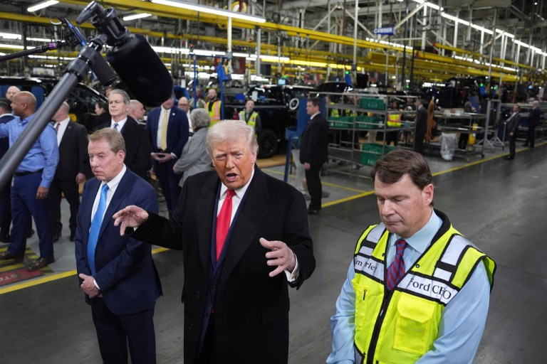 President Donald Trump speaks as Bill Ford, executive chairman of Ford, and Jim Farley, CEO of Ford, listen during a tour of the Ford River Rogue complex.
