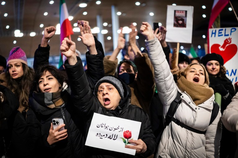 Protesters participate in a demonstration supporting protesters in Iran,