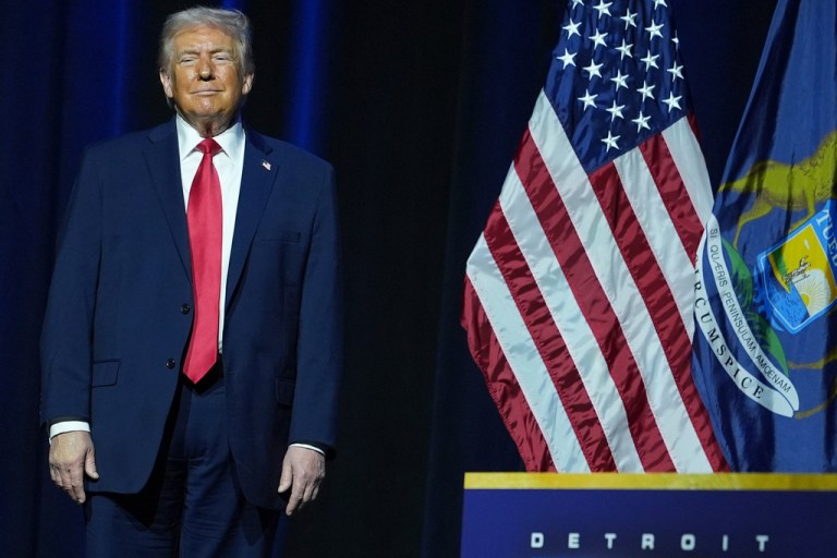 President Donald Trump arrives to speak at the Detroit Economic Club at the MotorCity Casino Hotel.