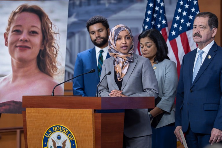 Members of the Congressional Progressive Caucus, from left, Rep. Maxwell Frost, D-Fla., Rep. Ilhan Omar, D-Minn., Rep. Pramila Jayapal, D-Wash., and Rep. Chuy Garcia, D-Ill., stand beside a photo of Renee Good, the woman shot and killed by a federal immigration officer in Minneapolis, as they announce they will work to limit funding for the Department of Homeland Security, during a news conference at the Capitol in Washington, Tuesday, Jan. 13, 2026. (AP Photo/J. Scott Applewhite)