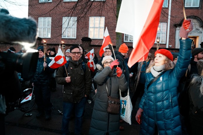 The demonstration under the slogan "Greenland belongs to the Greenlanders" is held in front of the U.S. Embassy in Copenhagen, Denmark.