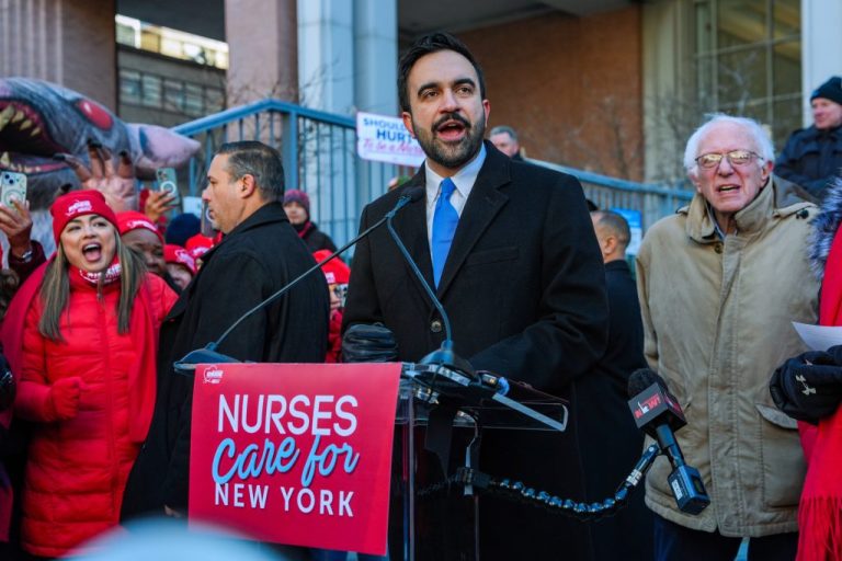New York Mayor Zohran Mamdani and Sen. Bernie Sanders (I-VT) speak in front of members of the New York State Nurses Association union during a picket outside Mount Sinai West Hospital.