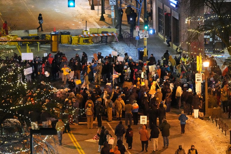 People gather during a vigil for 37-year-old Alex Pretti.