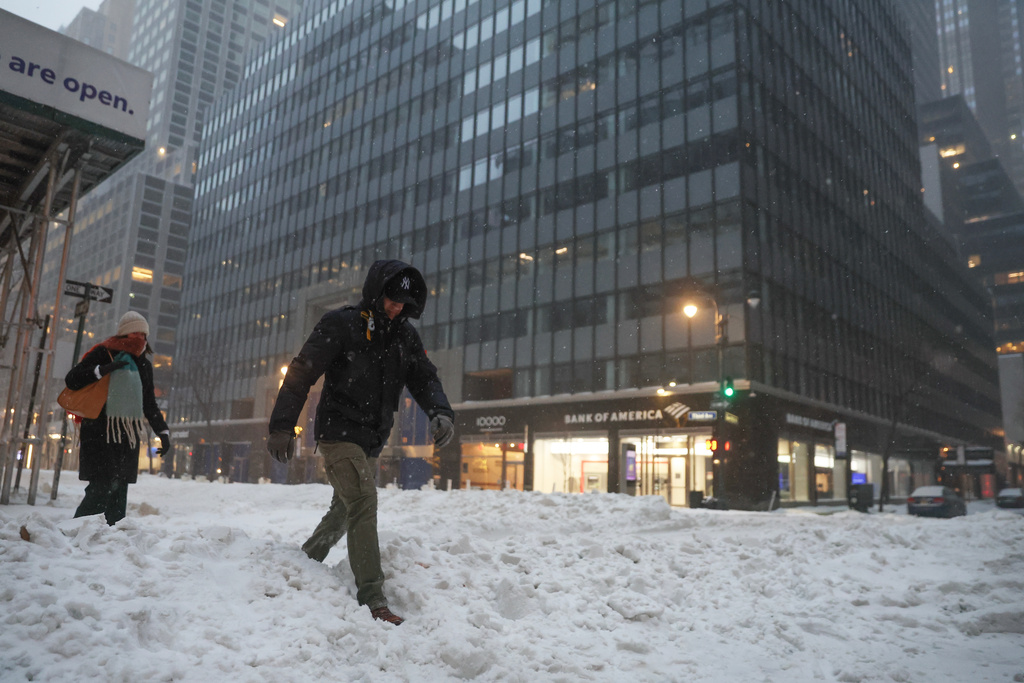Over a dozen declared dead after major winter storm shutters schools, offices, and airports