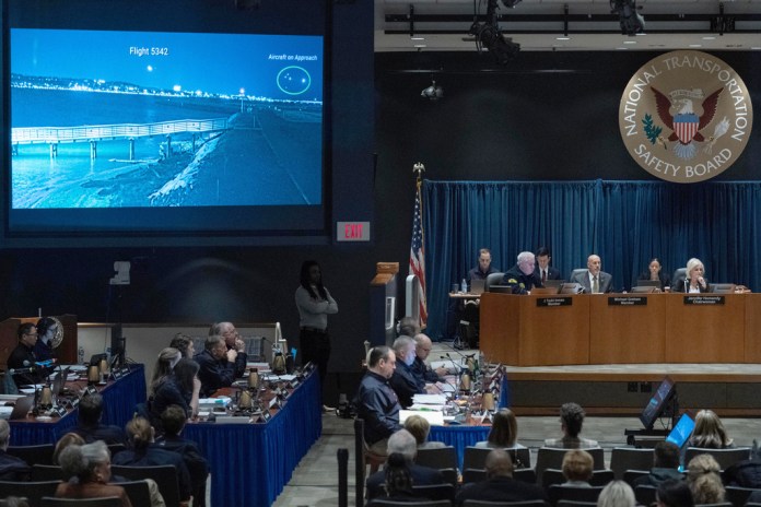 National Transportation Safety Board (NTSB) Chairwoman Jennifer Homendy presides over the NTSB fact-finding hearing on the DCA midair collision accident, at the National Transportation and Safety Board boardroom in Washington, Tuesday, Jan. 27, 2026. (AP Photo/Jose Luis Magana)