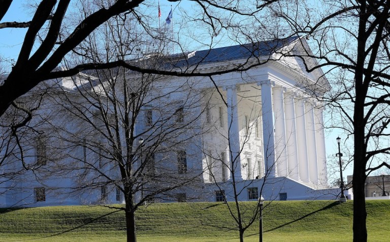 The state and U.S. flags fly over the Virginia State Capitol as the 2024 session of the Virginia General Assembly gets underway, Jan. 10, 2024, in Richmond, Va.