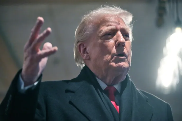 President Donald Trump speaks during a visit at a restaurant in Urbandale, Iowa.